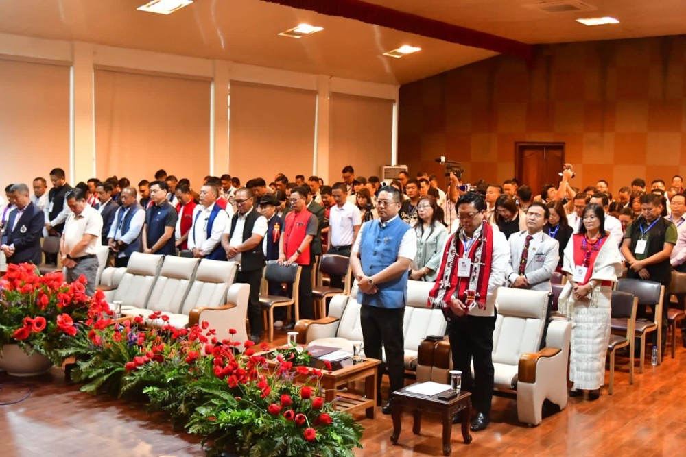 NLA Speaker Sharingain Longkumer (front in waist coat) and NCS officers taking a moment of silence in memory of NCS officers, who are no more, at the 46th NCSA general conference in Chümoukedima on October 20.