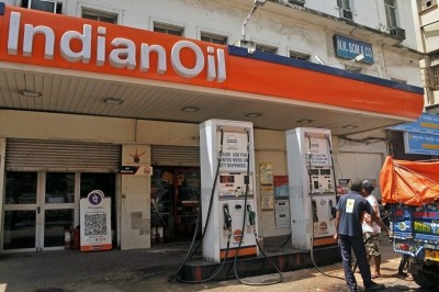 Indian Oil staff attend customers at a petrol pump in Kolkata on June 25, 2020. Transport fuel diesel prices continued its roll on Thursday, surpassing Rs 80 per litre mark in Delhi with oil marketing companies raising its prices on the 19th consecutive day. However, the prices of petrol continued to be higher than diesel rates in the metro city of Kolkata with Petrol priced at Rs 81.61 and Diesel at Rs 75.18 per litre on Thursday. (Photo: Kuntal Chakrabarty/IANS)