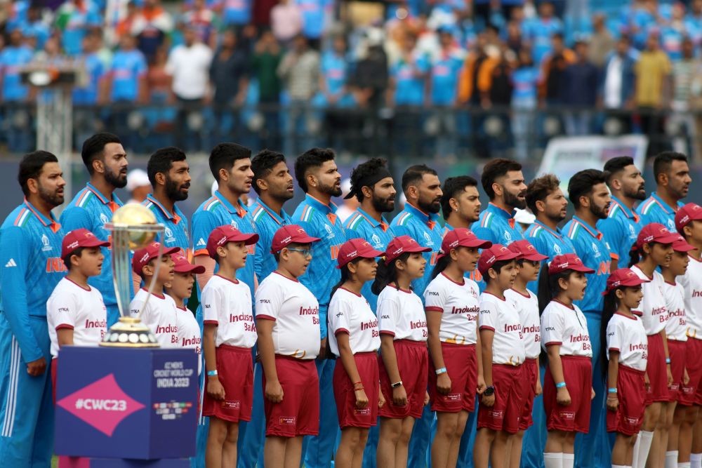 Dharamshala : Indian team players during their National Anthem before the start of the ICC Men's Cricket World Cup match between India and New Zealand at HPCA Stadium in Dharamshala, on Sunday, October 22, 2023. (Photo: IANS/Biplab Banerjee)