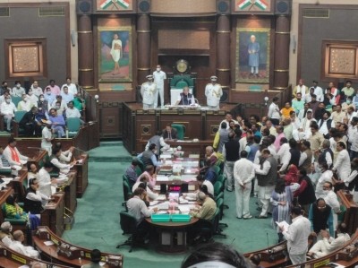 Congress MLAs protesting in MP Assembly during budget presentation.. (IANS File Photo)
