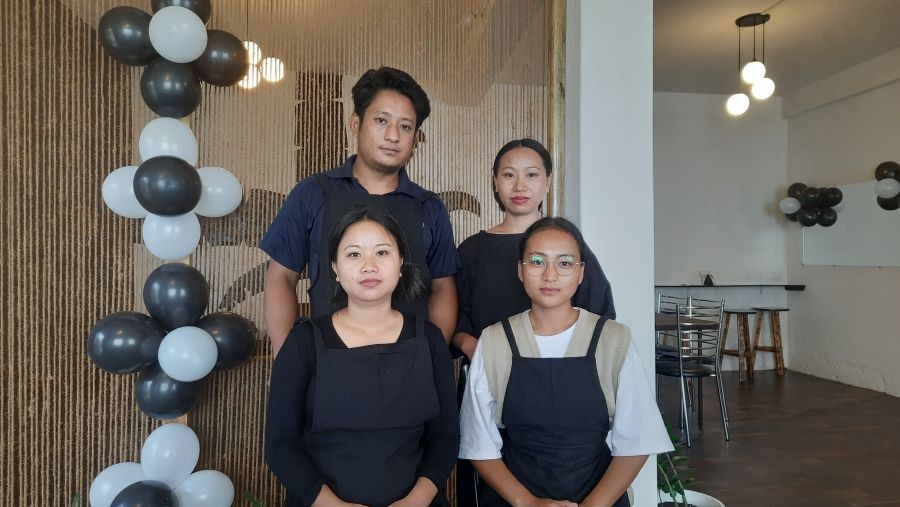 Shekhonu Rhakho and Samanier Jamir (standing) along with staffs of Food Fusion at the newly opened restaurant in Kohima