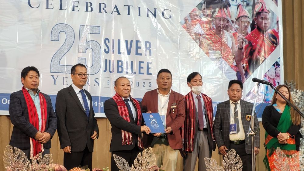 Advisor for DUDA and Geology & Mining, W Chingang Konyak releases MCUK jubilee souvenir in Kohima on October 24. (Morung Photo)