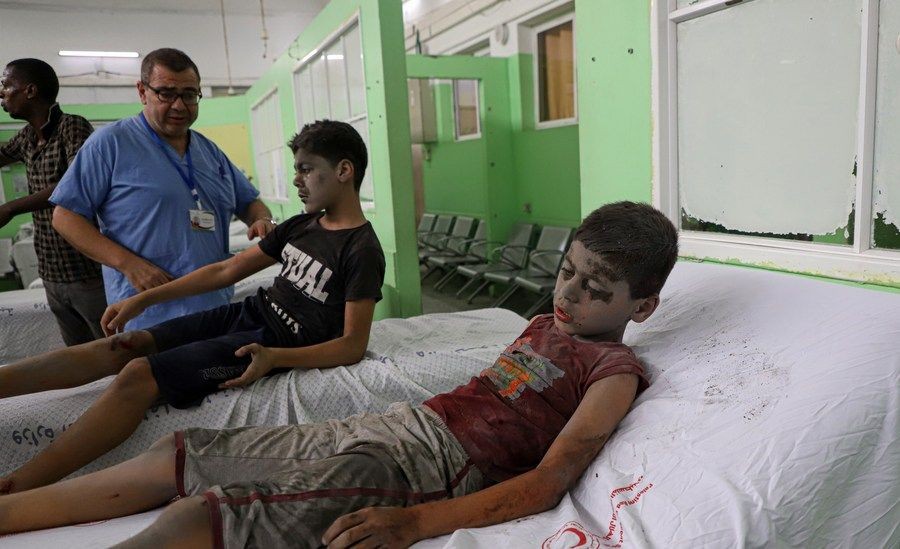 Children injured in an Israeli airstrike are treated at a hospital in Gaza City, on Oct. 9, 2023. (Photo by Rizek Abdeljawad/Xinhua/IANS)