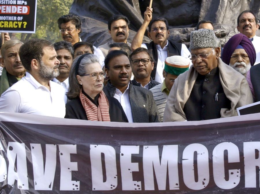 Congress President Mallikarjun Kharge with party leader Rahul Gandhi, Sonia Gandhi and other opposition leaders during a protest over the suspension of MPs amid the Winter session of Parliament, in New Delhi, Wednesday, Dec. 20, 2023. (IANS/Qamar Sibtain)