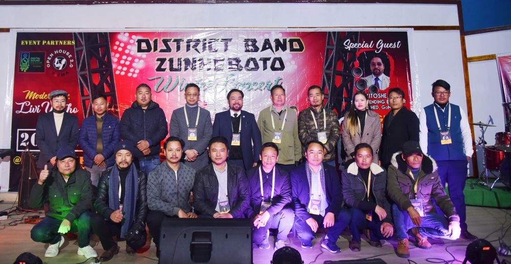 Er Kitoshe Aye, Superintending Engineer, PHED with the District Band Zunheboto and organisers at Multi Purpose Hall, Zunheboto Town on December 20.