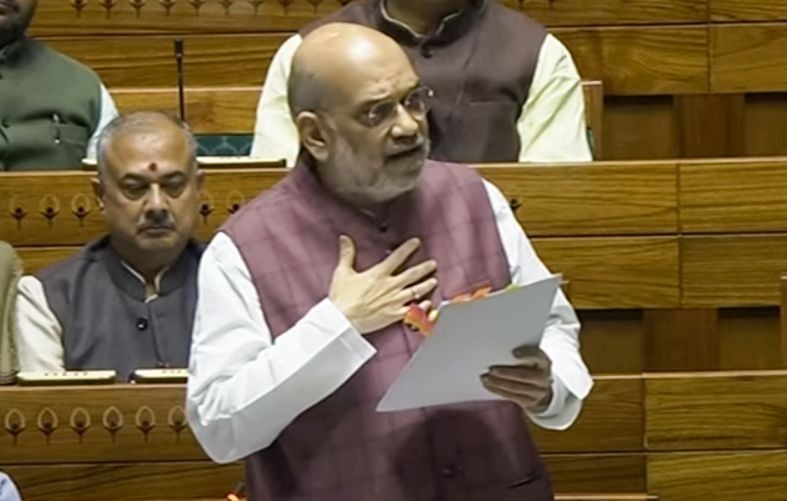 New Delhi: Union Home Minister speaks in the Lok Sabha during the Winter session of Parliament, in New Delhi on Wednesday, December 6, 2023. (Photo: IANS/Sansad TV)