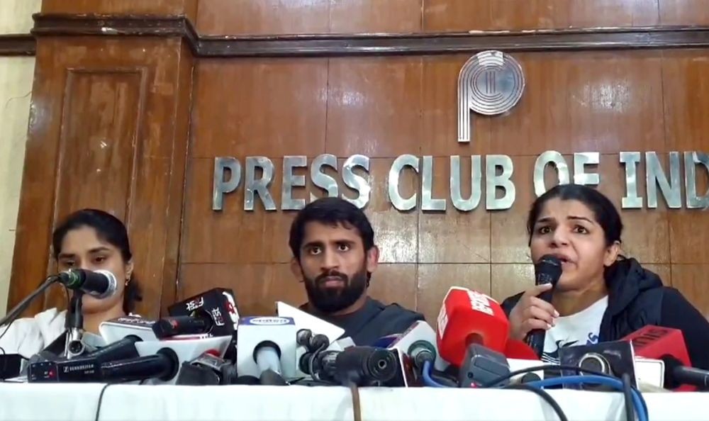 New Delhi: Wrestler Sakshi Malik, Bajrang Punia and Vinesh Phogat speaks to the media,in New Delhi, Thursday, Dec 21, 2023. WFI chief Brij Bhushan Sharan Singh's aide Sanjay Singh elected as the new president of the WFI.(IANS/Video Grab)