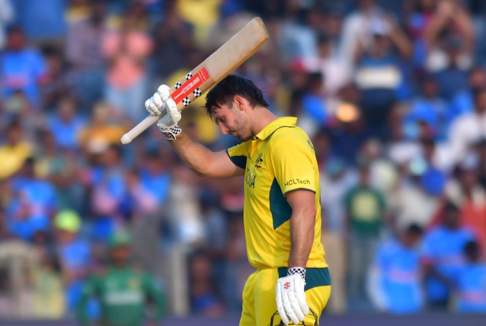 Pune : Australia's Mitchell Marsh celebrates his century during the ICC Men's Cricket World Cup match between Australia and Bangladesh in Pune, Saturday, Nov. 11, 2023. (Photo: IANS/Nitin Lawate)