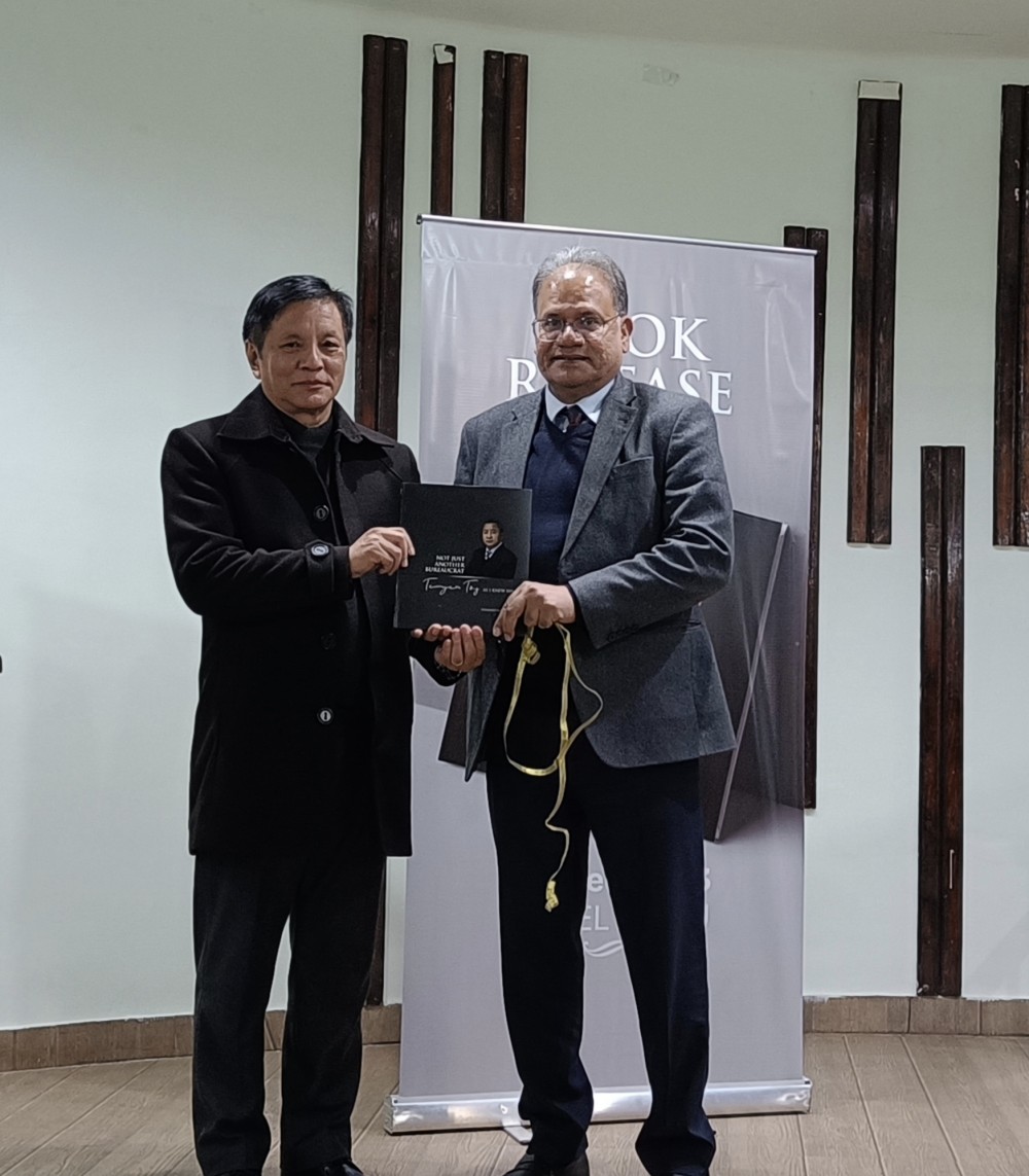 Chief Secretary of Nagaland, J Alam releasing the book ‘Not just another Bureaucrat: Temjen Toy as I knew him’ written by Limawati Longchar at Hotel Japfü on December 15. (Morung Photo)