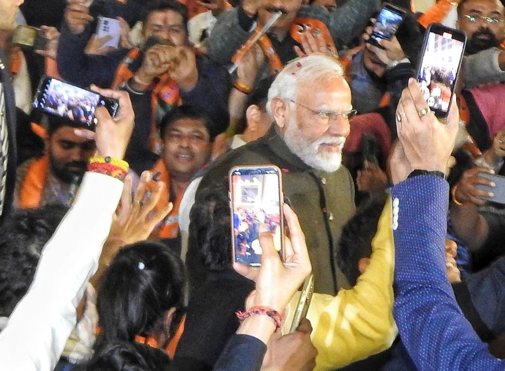 New Delhi: Prime Minister Narendra Modi with BJP National President J.P. Nadda arrives to attend celebrations after party's victory in elections to the Legislative Assemblies of Madhya Pradesh, Rajasthan and Chhattisgarh, at BJP headquarters, in New Delhi, Sunday, Dec. 3, 2023. (Photo: IANS/Anupam Gautam)