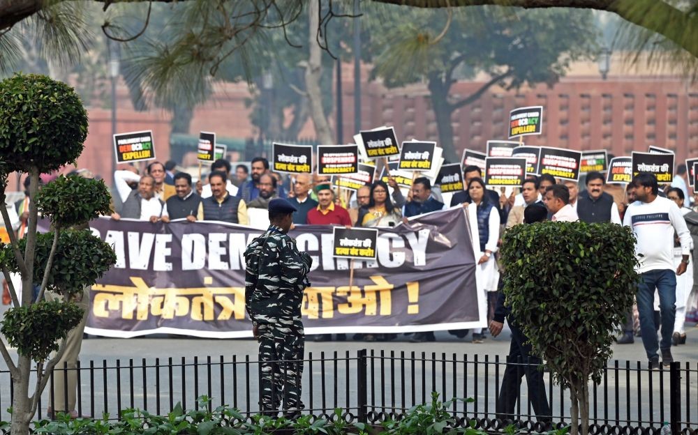 New Delhi: Suspended MPs during the protest march at Vijay Chowk, in New Delhi on Thursday, Dec 21, 2023. (Photo: IANS/Wasim Sarvar)