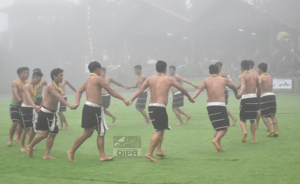 Angami cultural troupe performing indigenous folk song and dance during the Cultural Extravaganza on day 7 of the Hornbill Festival at Naga Heritage Village, Kisama on December 7. (DIPR Photo)