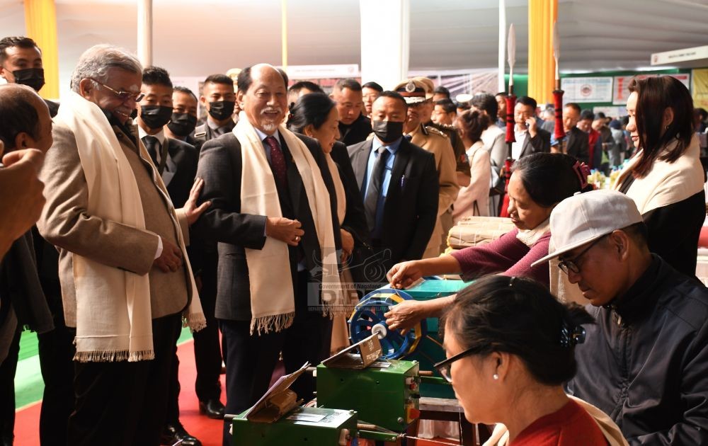 Governor, La. Ganesan and Chief Minister, Neiphiu Rio visiting the exhibition stalls in Kohima. (DIPR Photo)
