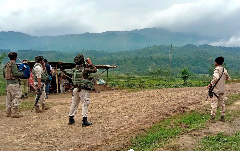 Bishnupur: Security officials patrol in the violence-hit area at Irengbam village of Bishnupur district in Manipur on June 19 ,2023. (Photo: IANS)