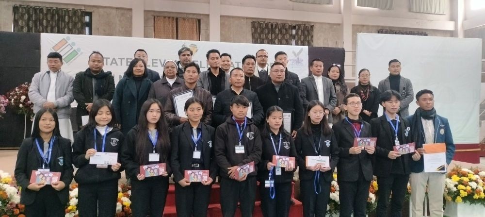 Special guest, Kesonyü Yhome IAS and other officials with the awardees during the State level 14th National Voters Day held at St Joseph’s College Jakhama on January 25. (DIPR Photo)