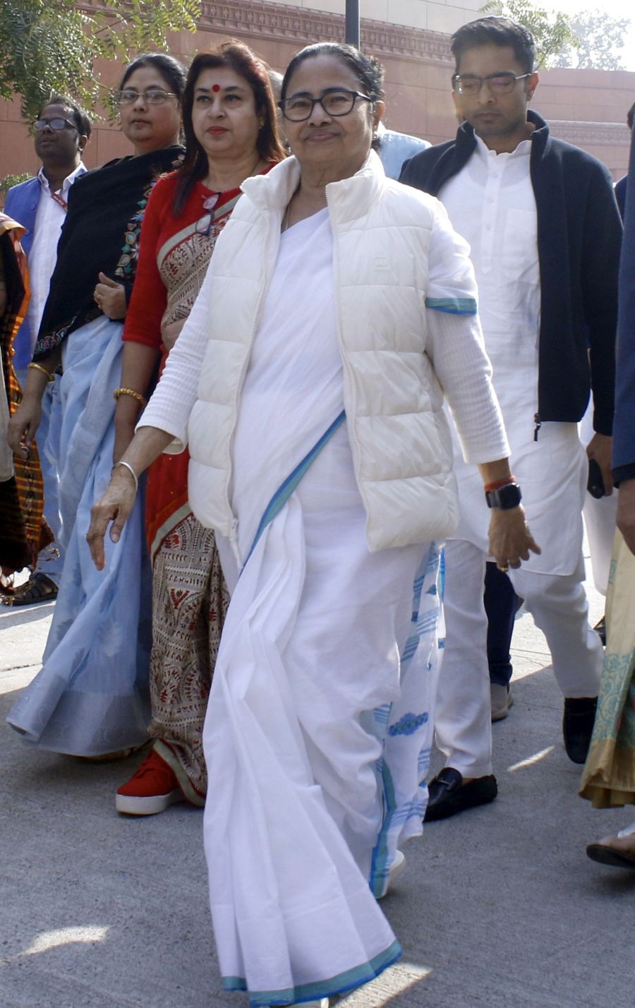 West Bengal Chief Minister and TMC supremo Mamata Banerjee with party MPs at the Parliament House Complex during the Winter session , in New Delhi, Wednesday, Dec. 20, 2023. (IANS/Qamar Sibtain)