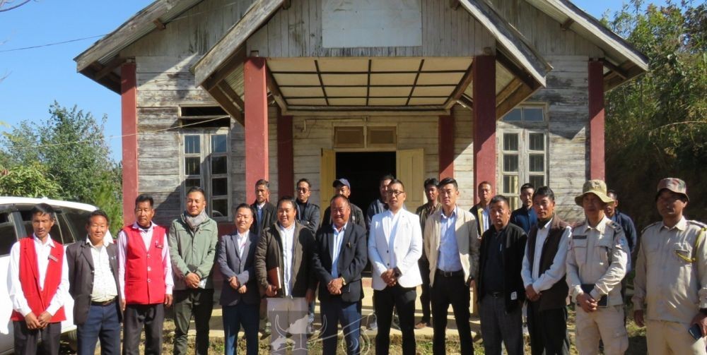 Advisor S Kiusumew Yimchunger with members of the Pungro SDPDB during the monthly meeting at the Cultural Hall in Pungro, Kiphire on January 9. (DIPR Photo)