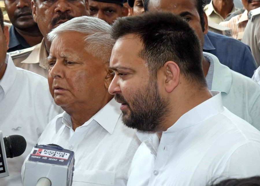 Bihar Deputy CM Tejashwi Yadav along with RJD chief Lalu Prasad speaks to the media after Patna High Court rejected the petition against Bihar government's caste-based survey, in Patna, on Tuesday, August 01, 2023. (Photo:IANS)