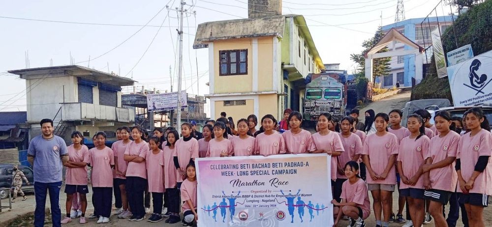 DC Dharam Raj IAS, along with the participants at the marathon race held in view of National Day of the Girl Child at Longleng on January 22. (DIPR Photo)