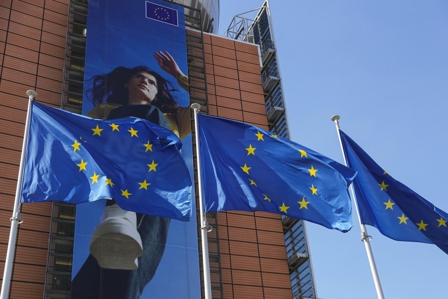 European Union flags fly outside the European Commission building in Brussels, Belgium, on June 9, 2021. (Xinhua/Zheng Huansong/IANS)
