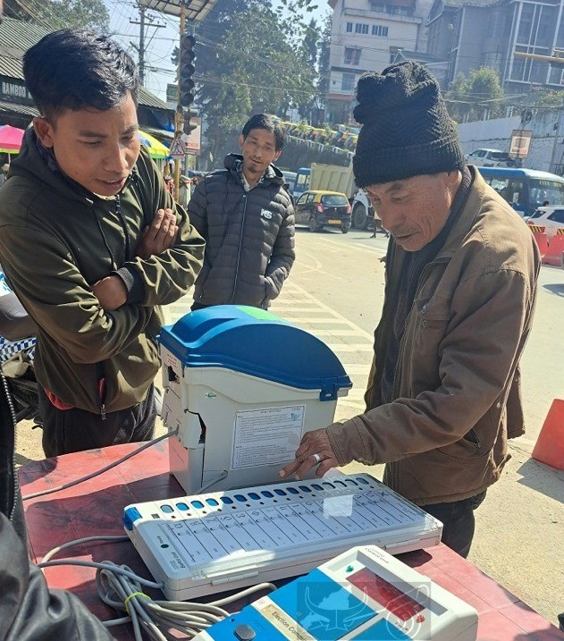 Public try the demonstration of the EVM and VVPAT at Kohima on February 8. (DIPR Photo)