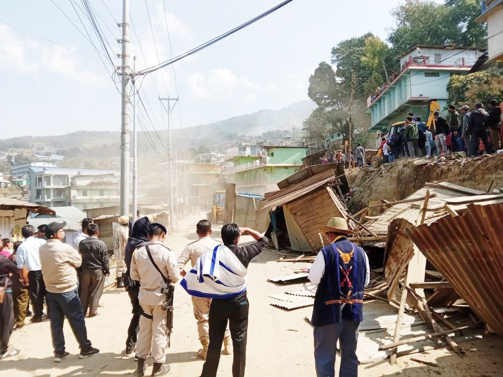 The district administration of Wokha undertakes the mop-up exercise for the removal of unauthorised structures within compensated land along NH-2 from KM 72.400 to KM 83.000 for a second day on February 13. (Morung Photo)