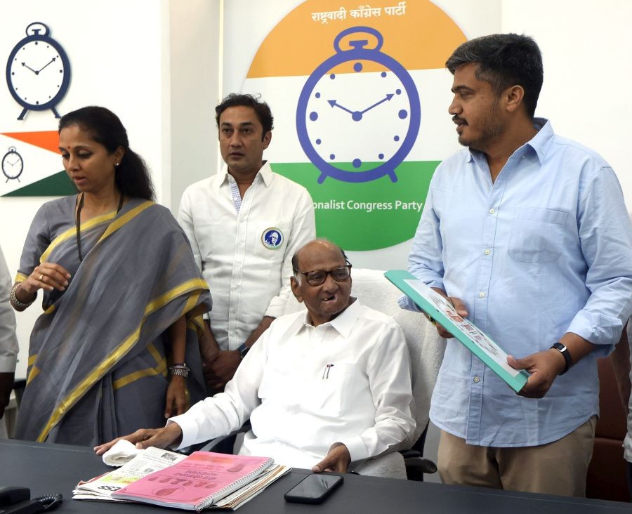 NCP Chief Sharad Pawar, along with NCP MLA Rohit Pawar and party MP Supriya Sule, before their appearance at the Directorate of Enforcement (ED) office for questioning in connection with the money laundering probe into the alleged Maharashtra State Cooperative Bank scam in Mumbai on Wednesday, January 24, 2024. (IANS)