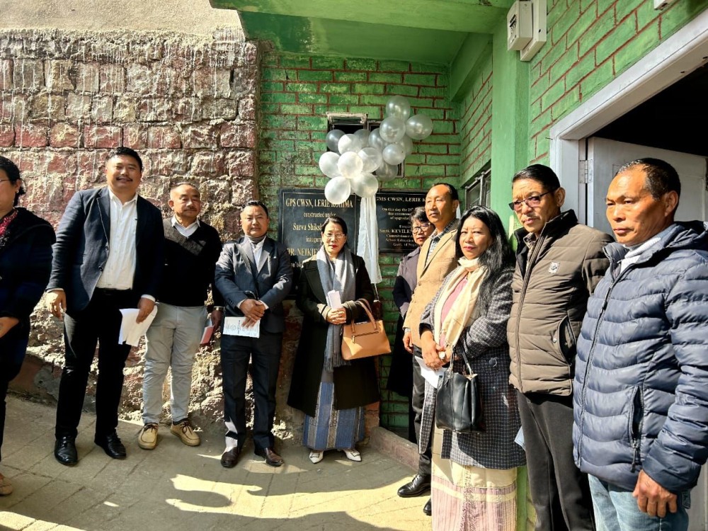 Kevileno Angami along with teachers and SMC members during the upgradation programme of GMS CWSN, Lerie, Kohima on January 29 last. (Morung Photo)