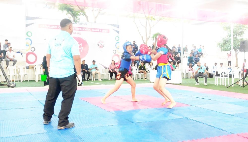 Bwensinha Seb (Red) in action against Sentizungla (Blue) as the two-day long Wushu competition, held as part of the ongoing 3rd Nagaland Olympic and Paralympic Games, kicks off at Arena E, Sovima Chümoukedima on February 15. (Photo Courtesy: NWA)