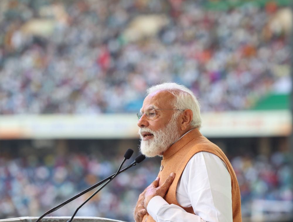 New Delhi: Prime Minister Narendra Modi addresses during an event of 'PM SVANidhi scheme at JLN Stadium in New Delhi,Thursday, March 14, 2024.(IANS/PIB)