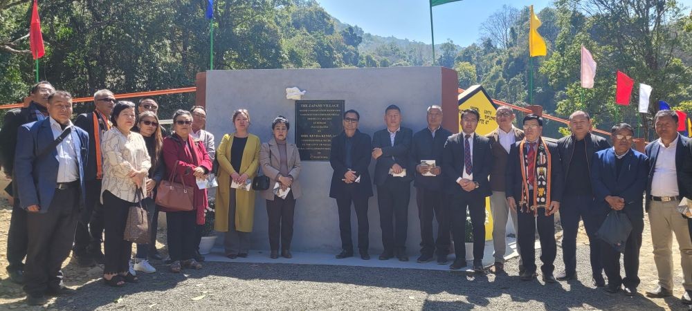 Kevisa Kense and others during the inauguration of water conservation reservoir at Zapami on March 5. (Morung Photo)