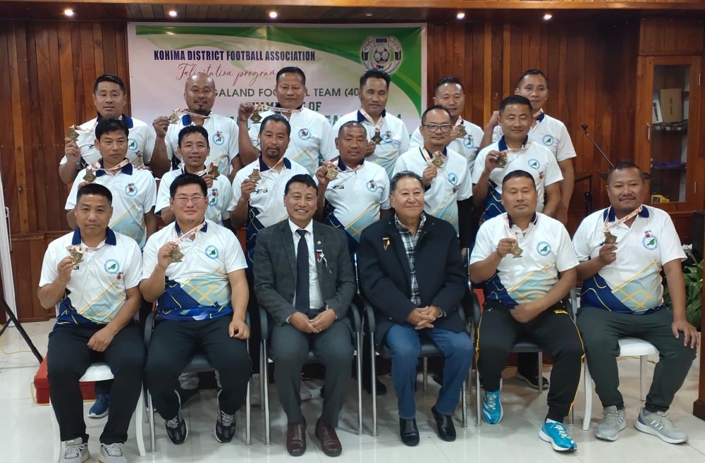 K Kire, Neibou Sekhose, KDFA officials with champion team.