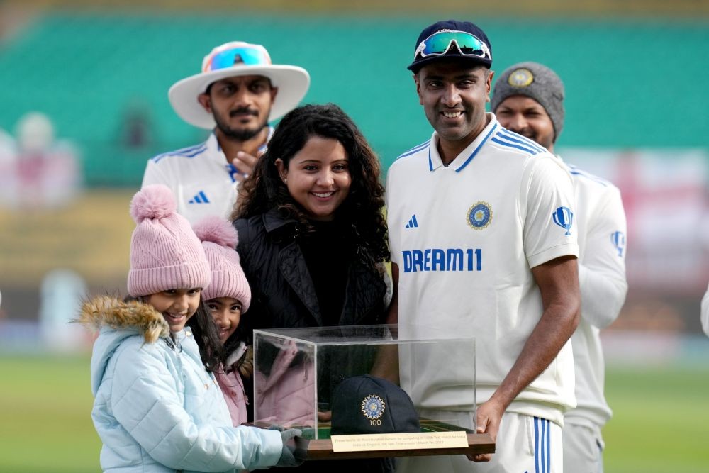 Dharamshala: India's Ravichandran Ashwin with his family after receiving the 100th Test cap before the start of the fifth Test cricket match between India and England, in Dharamshala, Thursday, March 7, 2024. (IANS/BCCI)