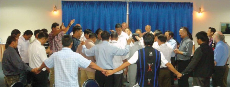 In this image released to the media, Naga delegates of the Naga Peace Summit V - Naga Reconciliation Process, are seen holding hands as they invoke the spirit of the Almighty during the recently-concluded meeting in June at Chiangmai, Thailand.