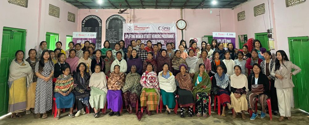 Dignitaries and participants of ‘Uplifting Women Street Vendors Program’ at Rüzaphema on March 21.