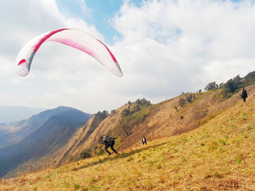 Taking flight: Paragliding finally in Nagaland. The inaugural flight being undertaken from Kapamodzü peak, the highest table top mountain in the state under Phek district. (Morung Photo)