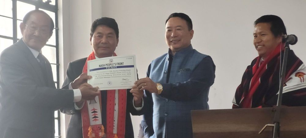 NPF leaders hand over NPF ticket to Kachui Timothy Zimik in Kohima on March 21. (Morung Photo)
