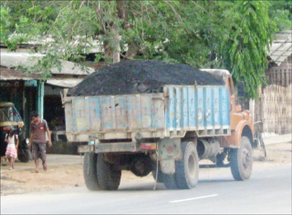 A coal-laden truck coming from towards Niuland and bound for Dimapur. With no worthwhile industry, most of the coal mined in Nagaland is used in small-scale businesses such as blacksmithy. (Morung Photo)