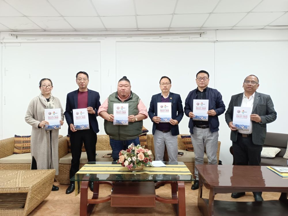 Minister for Tourism & Higher Education, Temjen Imna Along with officials and staff of Directorate of Tourism during the release of Tourism Policy in Kohima on March 20.