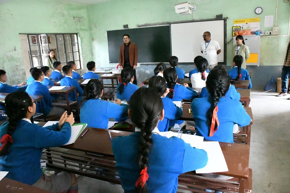 SDO (C), Wokha Nuhuta Tunyi addressing the students before the essay and slogan writing competition held at Libemo Memorial School, Wokha on April 5. (DIPR Photo)