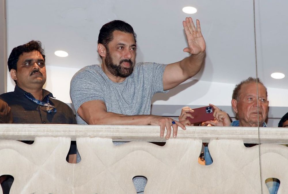 Mumbai: Actor Salman Khan waves at fans gathered outside his residence 'Galaxy' on his birthday in Mumbai on Wednesday, December 27, 2023. (Photo: IANS)