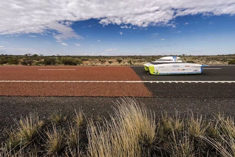 The Punch Powertrain Solar Team car from Belgium competes in the 2017 World Solar Challenge near Kulgera, Australia. AP Photo/Geert Vanden Wijngaert