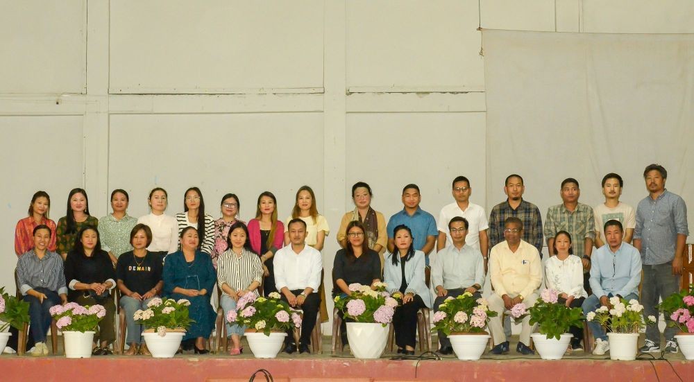 UPSC topper Chubalemba B Chang with the faculty of GHSS Tuensang on May 15. (Morung Photo)