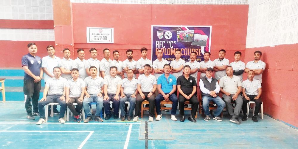 NFA president K Neibou Sekhose along with coaches and instructor at IG Stadium Kohima on Thursday.