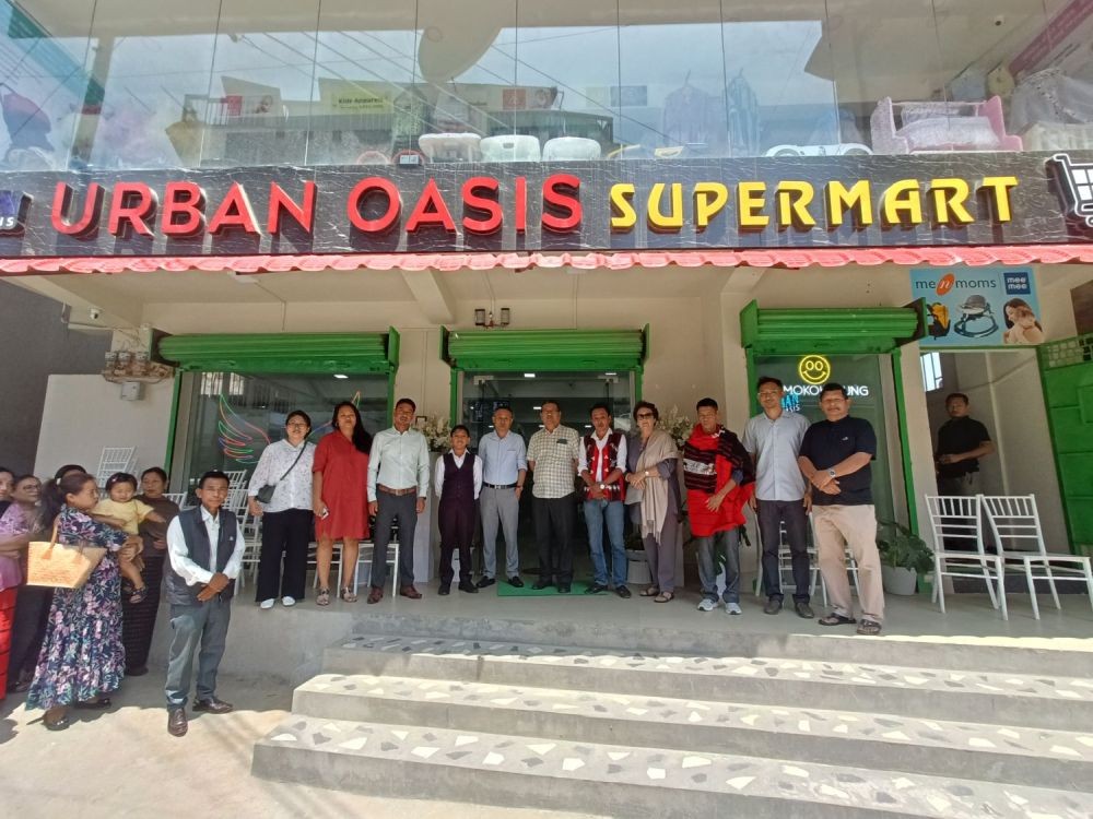 ADC Mokokchung, Chumlamo Humtsoe with Rev Ponen Longchar, Pastor, MTBA, Proprietors and well-wishers at the inauguration of Urban Oasis Super Mart in Arkong ward, Mokokchung on May 1.