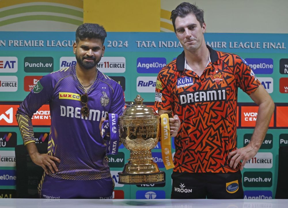 Chennai: Kolkata Knight Riders captain Shreyas Iyer and Sunrisers Hyderabad captain Pat Cummins pose with the trophy during a press conference ahead of the IPL 2024 final match, in Chennai on Saturday, May 25, 2024. (Photo: IANS)