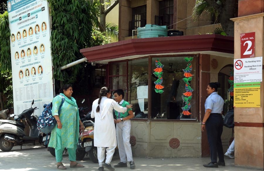 Parents and school children at Bal Mandir SR SEC School at Preet Vihar, after multiple schools received a bomb threat, in New Delhi, Wednesday, May 1, 2024.(IANS)