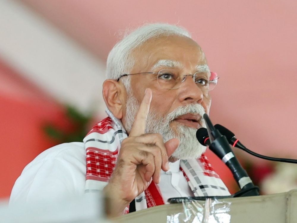 Balangir: Prime Minister Narendra Modi addresses during a public meeting amid ongoing Lok Sabha Elections, in Balangir,Saturday, May 11, 2024.(IANS)