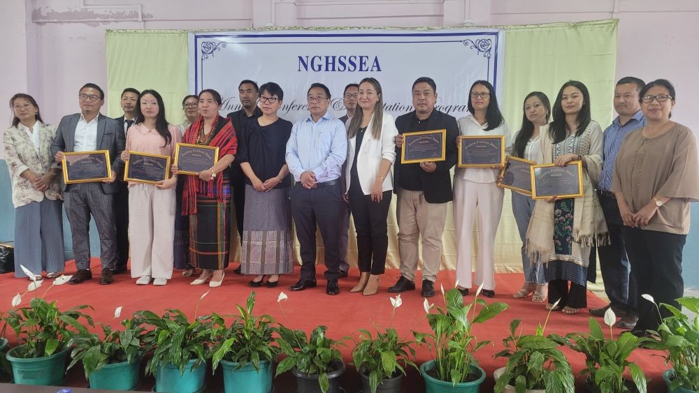 Kevileno Angami and others with awardees during annual conference-cum-felicitation programme of NGHSSEA held in Kohima on May 17.  (Morung Photo)