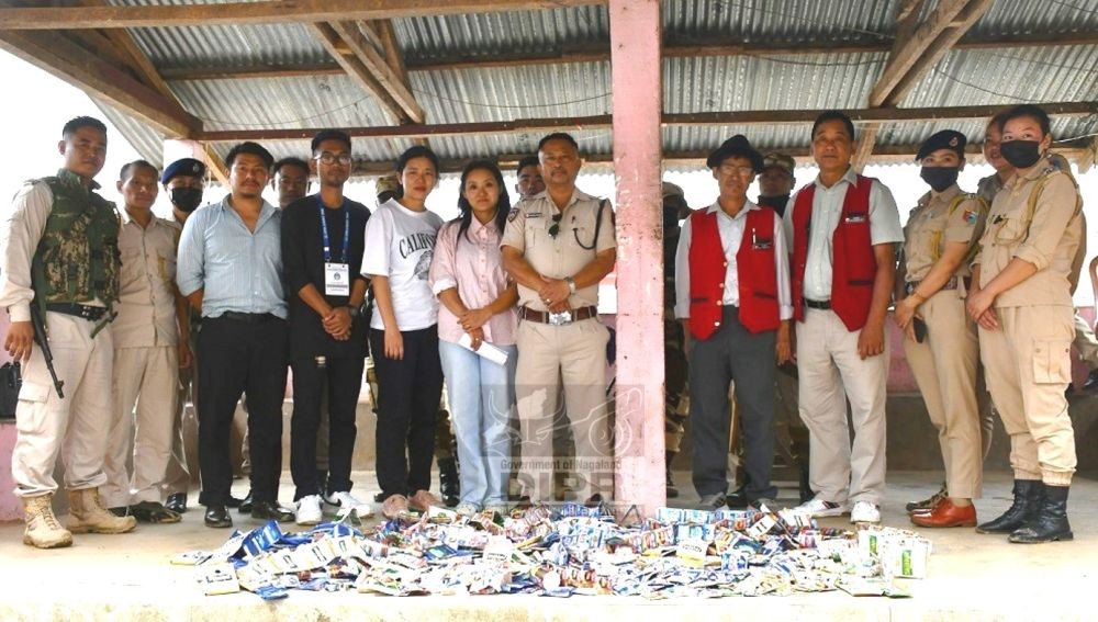 The COTPA flying squad team led by O/C, Wokha PS and others during the enforcement drive on selling of tobacco products in and around educational institutions on May 27. (DIPR Photo)